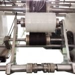 Automatically load the jumbo roll of stretch film